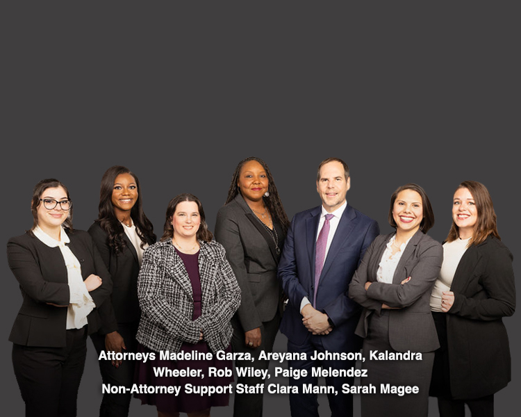 Group picture of Attorneys Madeline Garza, Areyana Johnson, Kalandra Wheeler, Rob Wiley, Paige Melendez, Non-Attorney Support Staff Clara Mann, Sarah Magee
