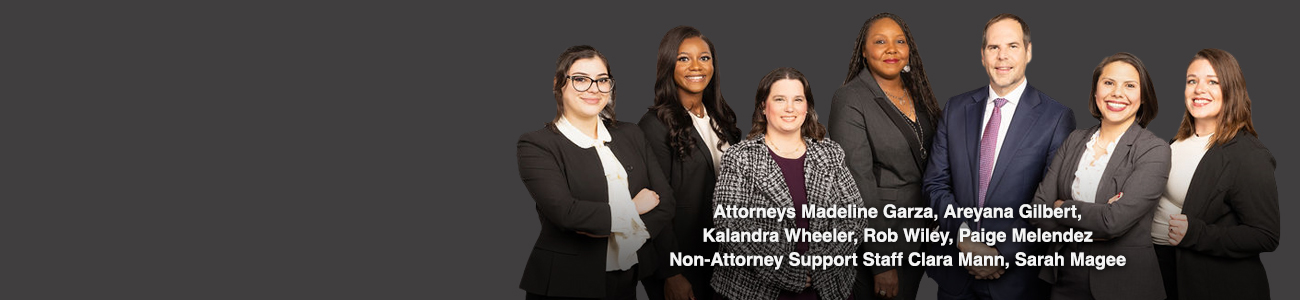 Group picture of Attorneys Madeline Garza, Areyana Johnson, Kalandra Wheeler, Rob Wiley, Paige Melendez, Non-Attorney Support Staff Clara Mann, Sarah Magee